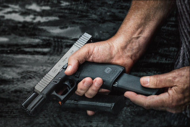 glock 45 handgun being loaded