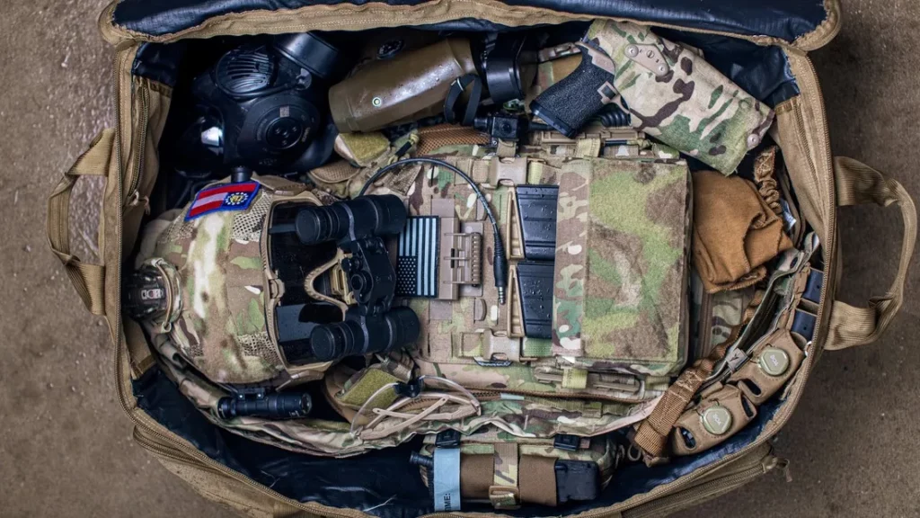 https://blog.primaryarms.com/wp-content/uploads/2023/09/tactical-gear-loadout-in-bag-1024x576.webp